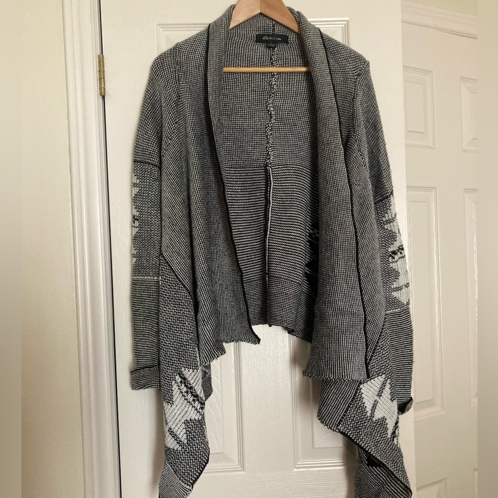 Seductions black and white knitted open cardigan.